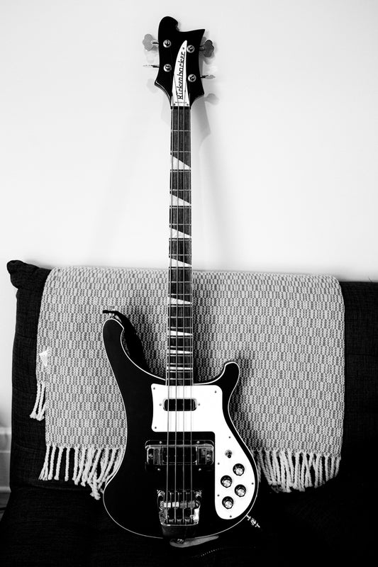 Guitar standing on a couch