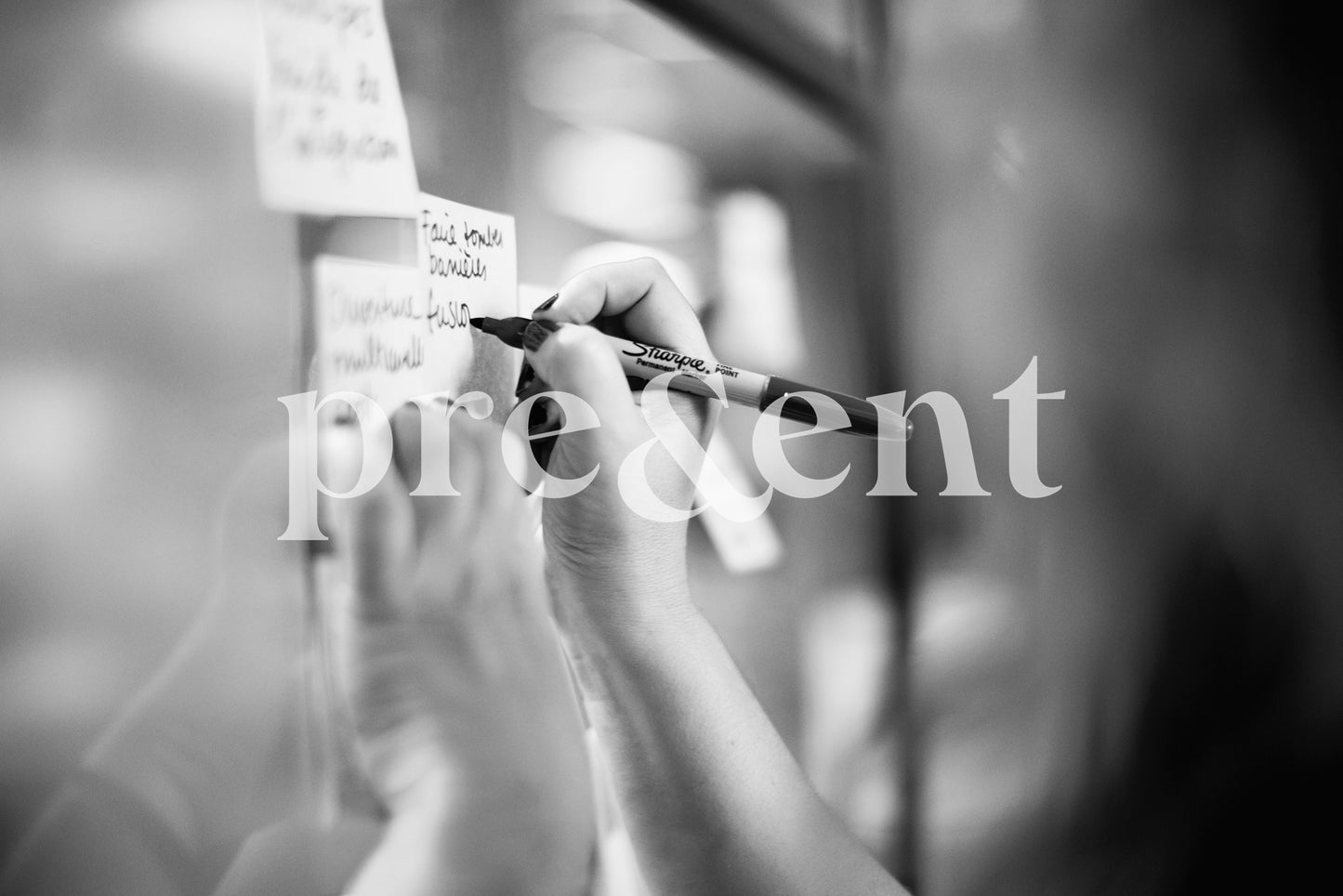 Writing on sticky notes during brainstorm