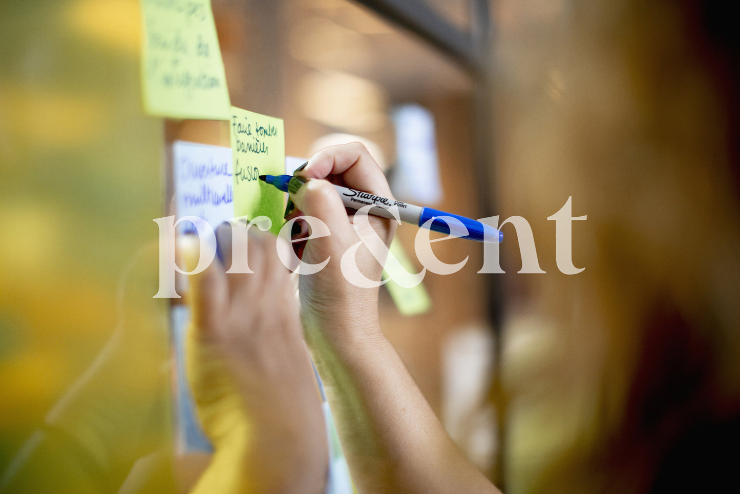 Writing on sticky notes during brainstorm