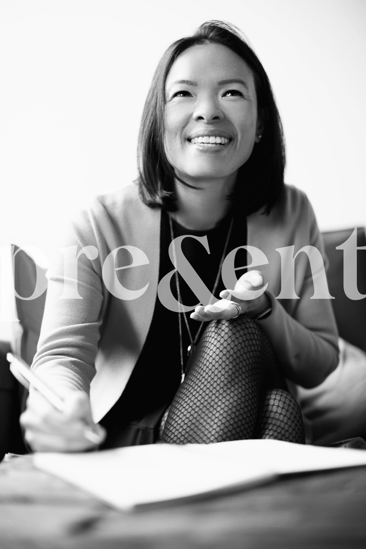 Smiling person writing in a notebook