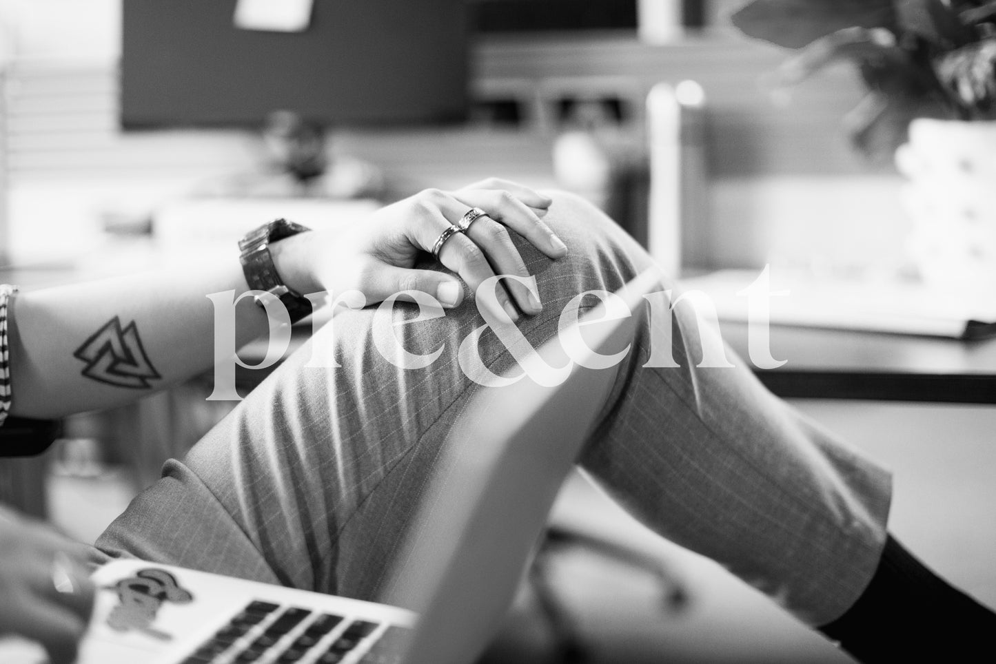 Relaxed person browsing on laptop