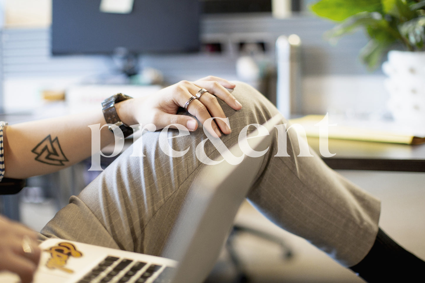 Relaxed person browsing on laptop