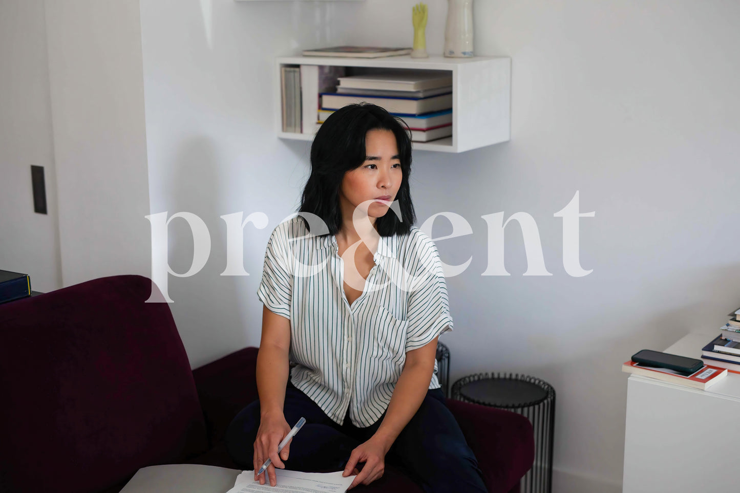 Someone thinking while looking at documents