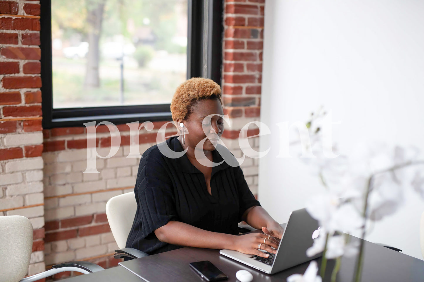 Person typing on a laptop