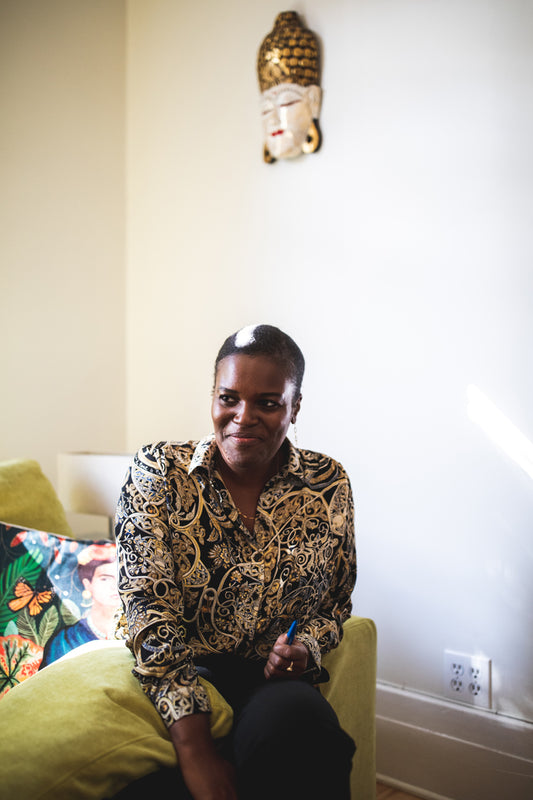 Portrait of a smiling person in a living room