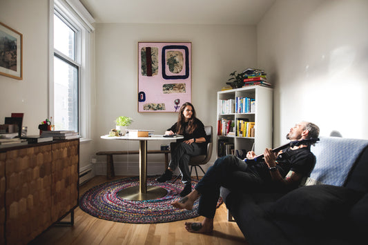 Couple at home, listening to music together