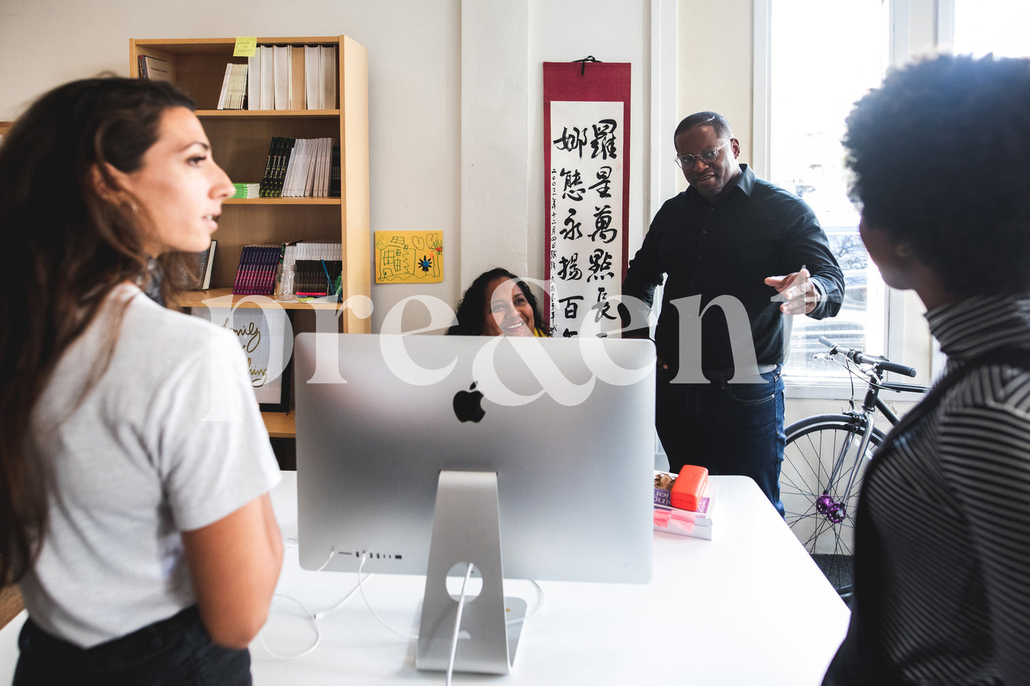 Group work session around a computer