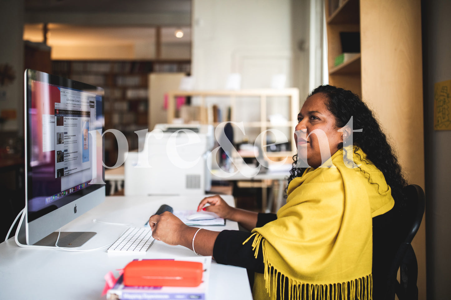 Someone focusing on a conversation in open space office