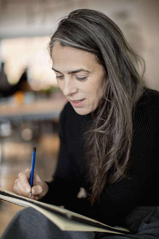 Écrire et dessiner dans un cahier