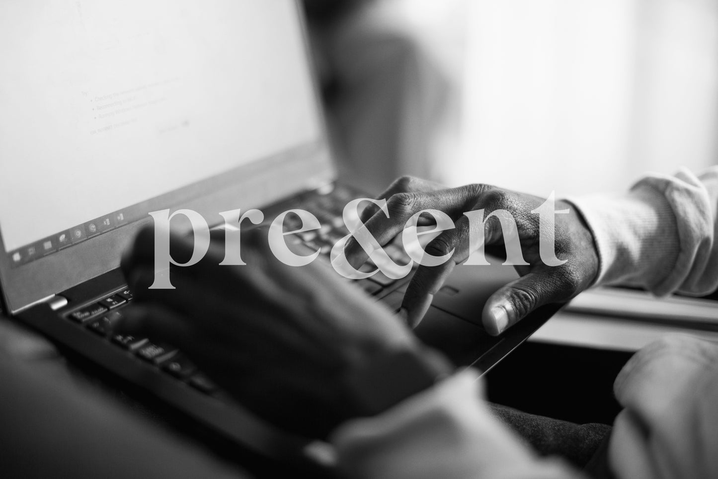 Close up of someone working on a computer