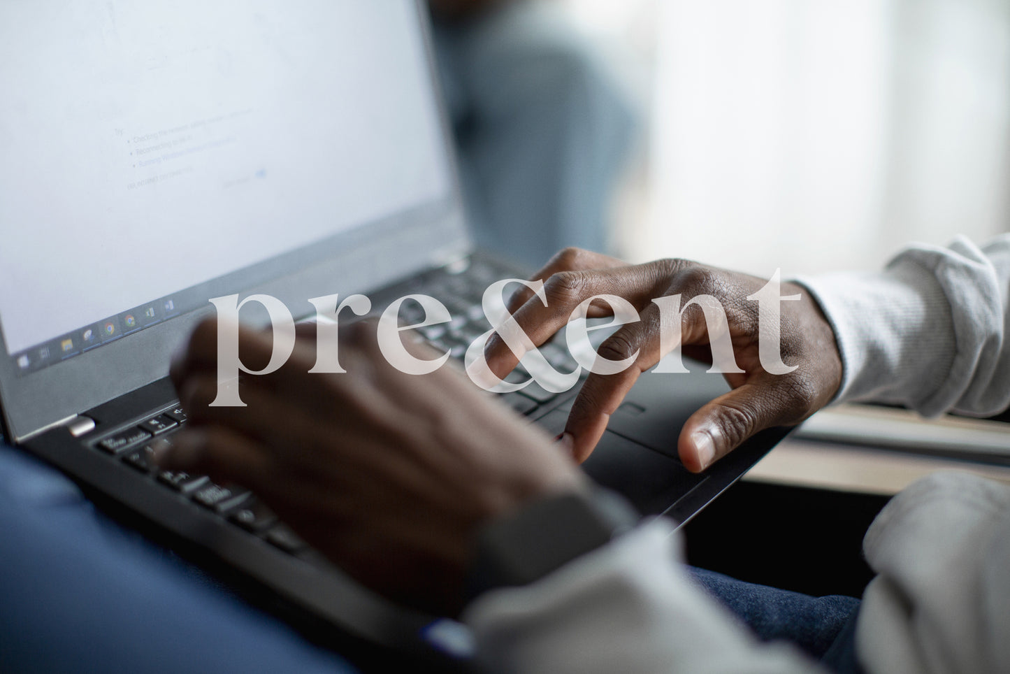 Close up of someone working on a computer